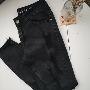 Ripped black skinny jeans straight cut